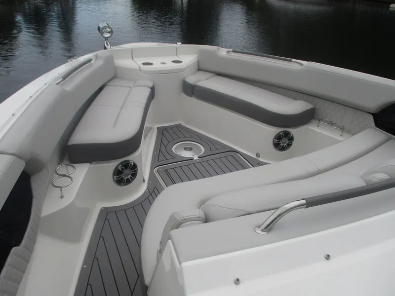 Slide: The Image of 2021 Sea Ray 400 SLX Outboard boat interior with spacious seating and modern design. - 7