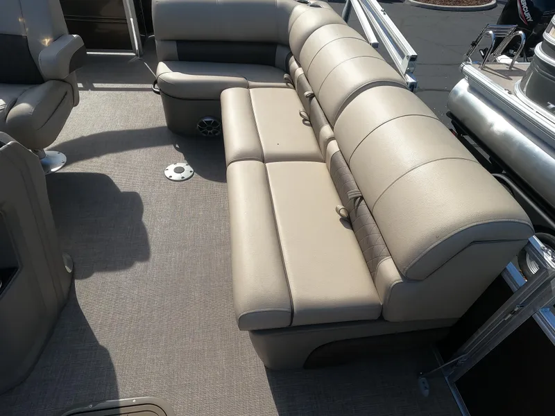 Slide: The Image of 2024 Sun Tracker Sportfish 24 XP3 pontoon boat interior seating. - 10