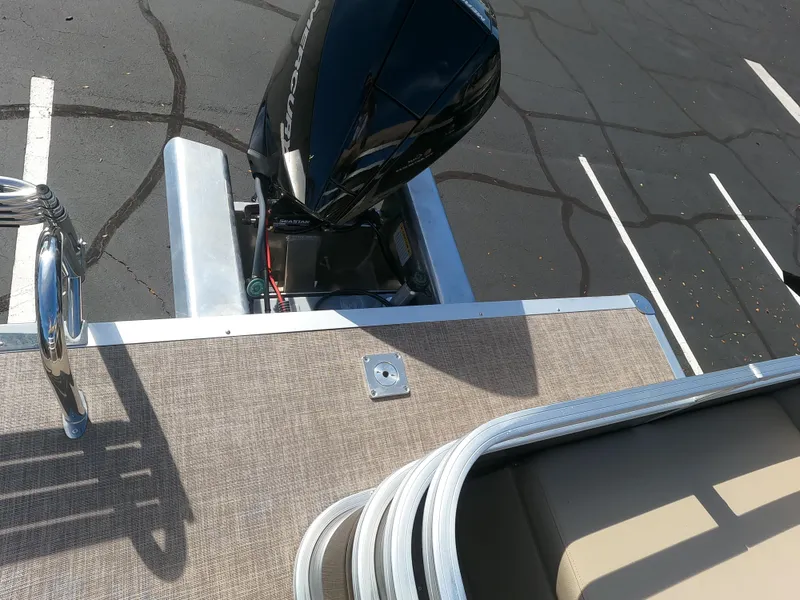 Slide: The Image of 2024 Sun Tracker Sportfish 24 XP3 pontoon boat rear deck and motor. - 16