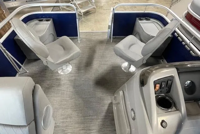 Slide: The Image of 2024 Bennington 18 SF boat interior with gray seating and modern design. - 9