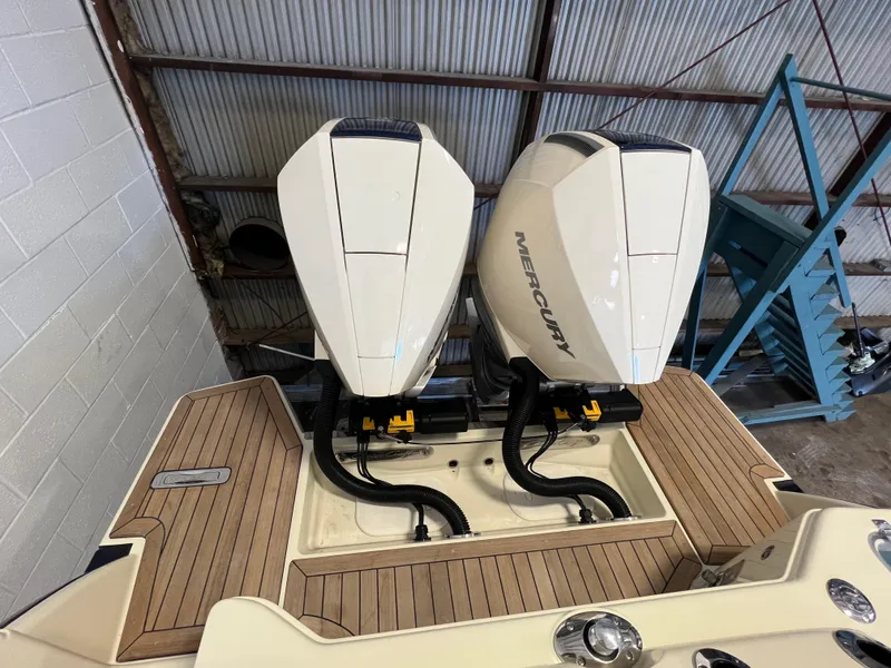 Slide: The Image of 2026 Chris-Craft Calypso 28 boat interior with luxurious seating and elegant design. - 17