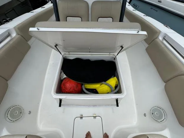 Slide: The Image of 2017 Sea Fox 288 Commander boat storage compartment with gear and seating. - 25