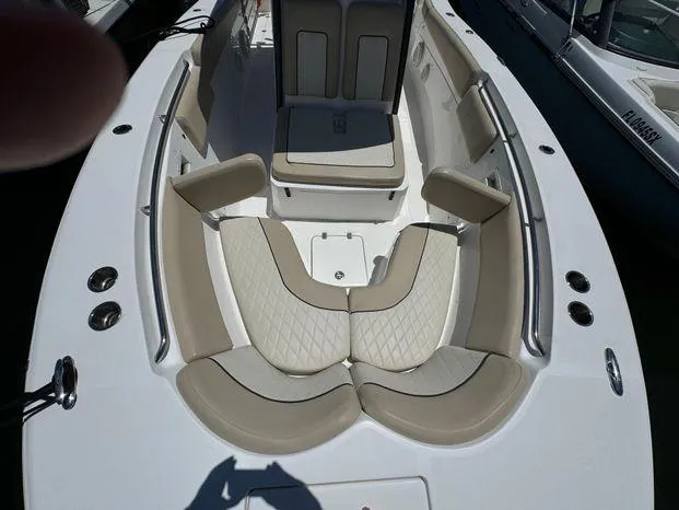 Slide: The Image of 2017 Sea Fox 288 Commander boat with beige seating and spacious deck layout. - 36
