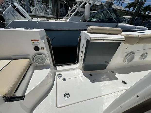 Slide: The Image of 2017 Sea Fox 288 Commander boat interior with seating and storage compartments. - 43