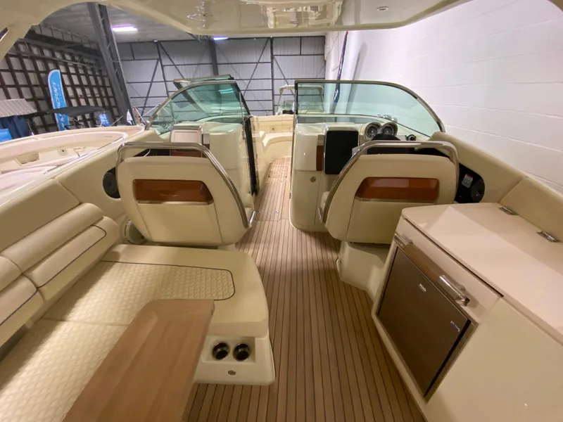 Slide: The Image of 2024 Chris-Craft LAUNCH GT 35 interior with luxurious seating and modern dashboard. - 17