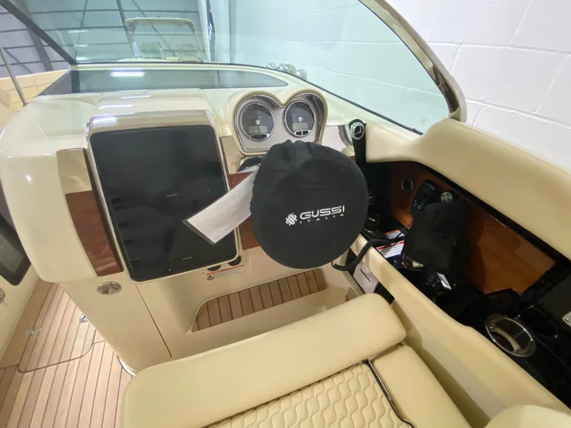 Slide: The Image of 2024 Chris-Craft LAUNCH GT 35 dashboard with Gussi steering wheel cover. - 19