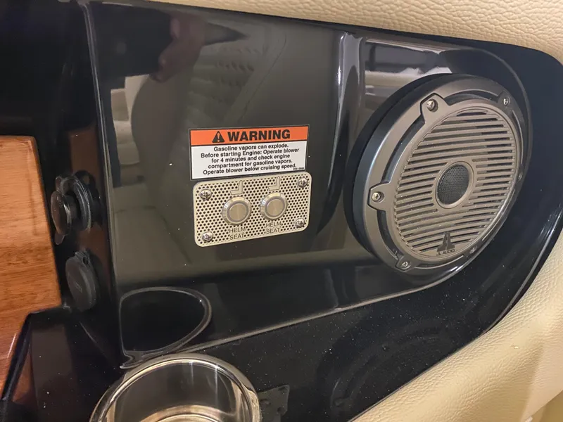Slide: The Image of 2024 Chris-Craft LAUNCH GT 35 interior speaker and warning label. - 21