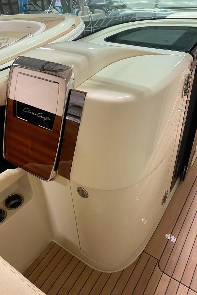 Slide: The Image of 2024 Chris-Craft LAUNCH GT 35 boat interior with sleek design and wood accents. - 23