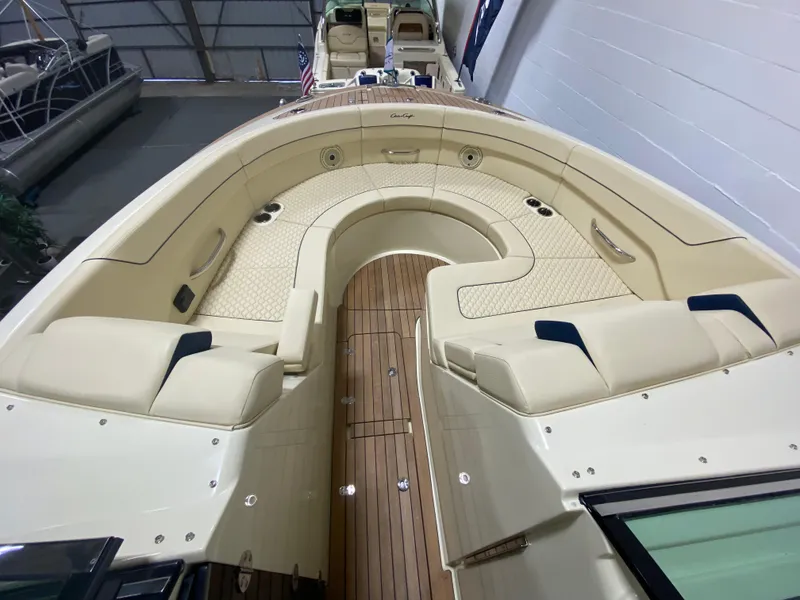 Slide: The Image of 2024 Chris-Craft LAUNCH GT 35 boat with luxurious seating and teak flooring. - 27