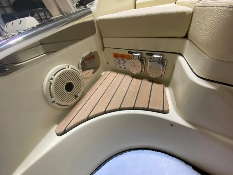 Slide: The Image of Interior detail of 2024 Chris-Craft LAUNCH GT 35, featuring speaker and control panel. - 33