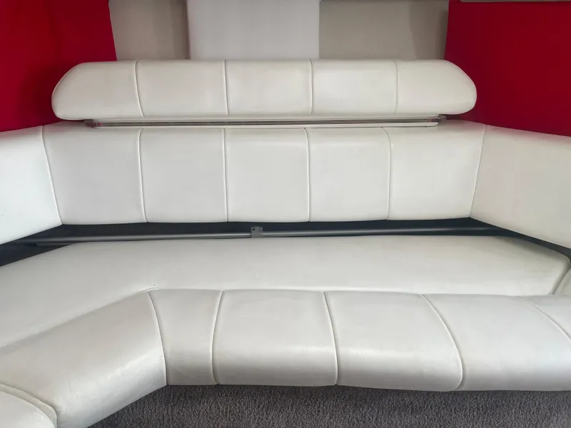 Slide: The Image of White leather seating in a 1995 Fountain 42 Executioner boat. - 19