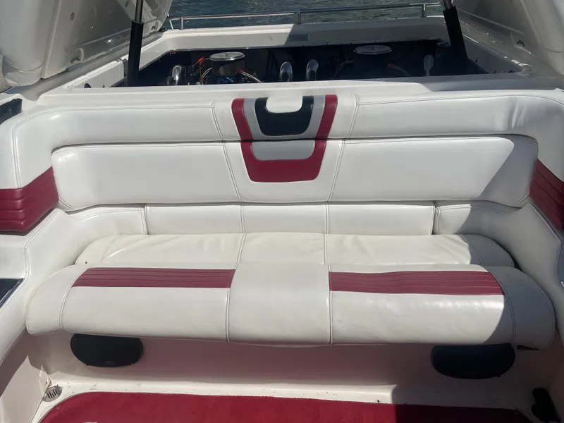 Slide: The Image of 1995 Fountain 42 Executioner boat interior with white and red seating. - 9