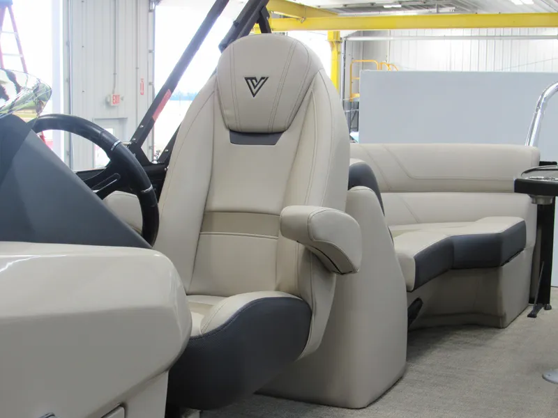 Slide: The Image of 2023 Viaggio Diamante U D21U boat interior with captain's chair and seating area. - 19