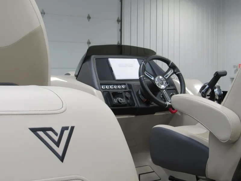 Slide: The Image of 2023 Viaggio Diamante U D21U boat interior with steering wheel and dashboard. - 7