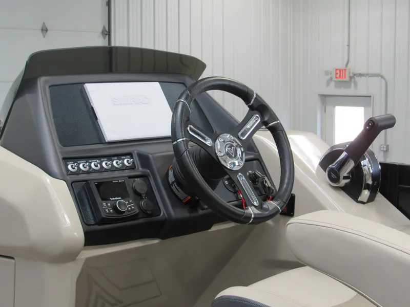 Slide: The Image of 2023 Viaggio Diamante U D21U boat dashboard with steering wheel and control panel. - 8