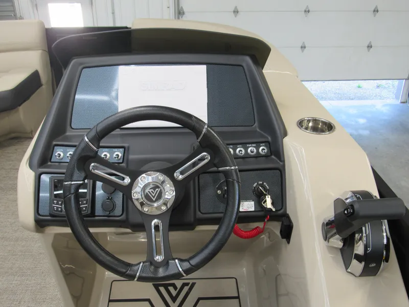 Slide: The Image of 2023 Viaggio Diamante U D21U boat dashboard with steering wheel and controls. - 9
