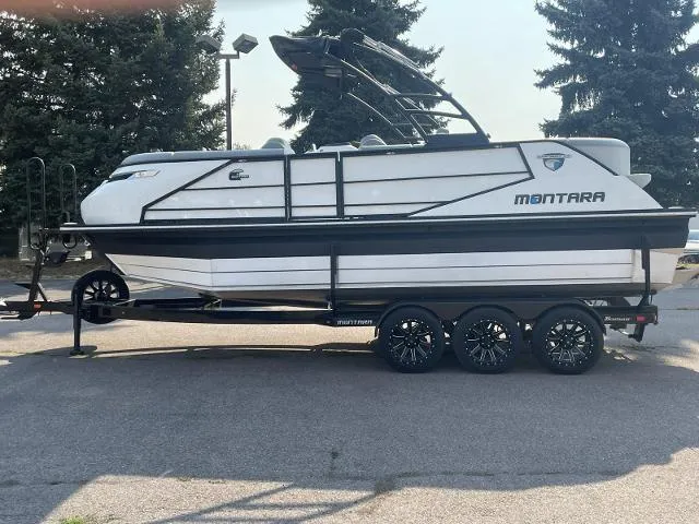 The Image of 2022 Montara Surf Boss 2.0 boat on a trailer, side view. - 1