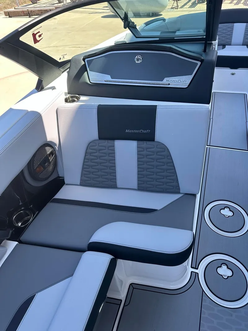 Slide: The Image of 2024 MasterCraft X24 boat interior with premium seating and modern design. - 6