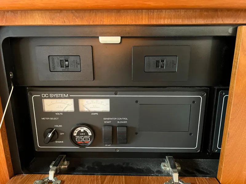 Slide: The Image of 2004 Tiara Yachts 3200 Open DC system control panel. - 24