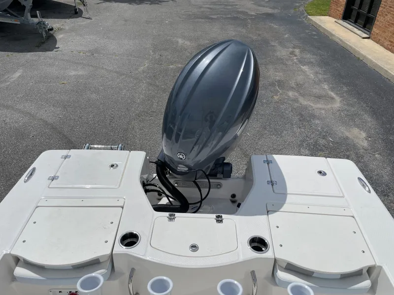 Slide: The Image of 2024 Robalo 206 Cayman boat stern with outboard motor. - 6