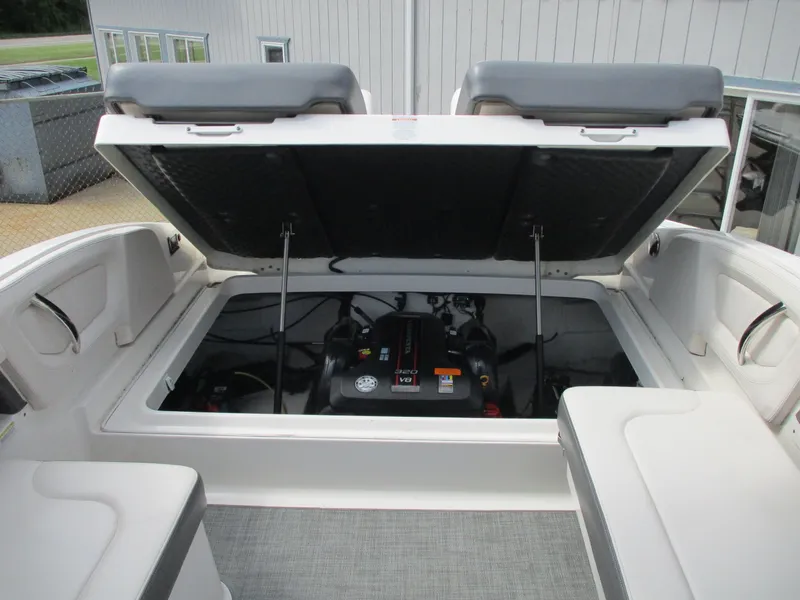 Slide: The Image of 2015 Chaparral 257 SSX engine compartment with open hatch. - 11