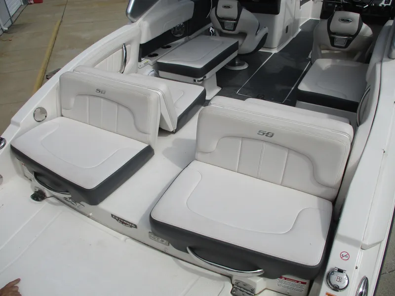 Slide: The Image of Interior of a 2015 Chaparral 257 SSX boat with white seating. - 4