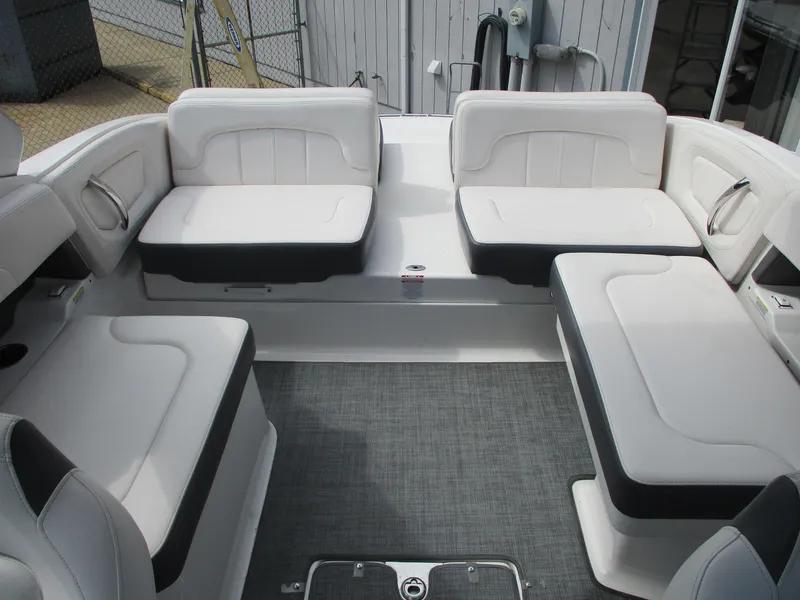 Slide: The Image of Interior of a 2015 Chaparral 257 SSX boat with white seating. - 5