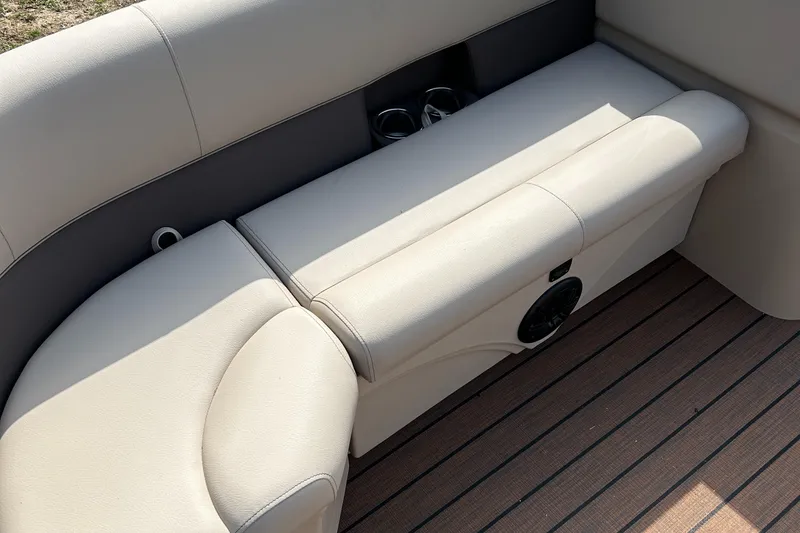 Slide: The Image of 2024 Bentley Pontoons LE 180 CR luxury seating with cup holders and speaker. - 4