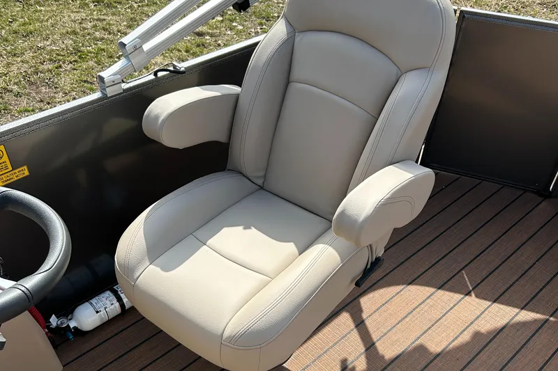 Slide: The Image of 2024 Bentley Pontoons LE 180 CR captain's chair on deck. - 7