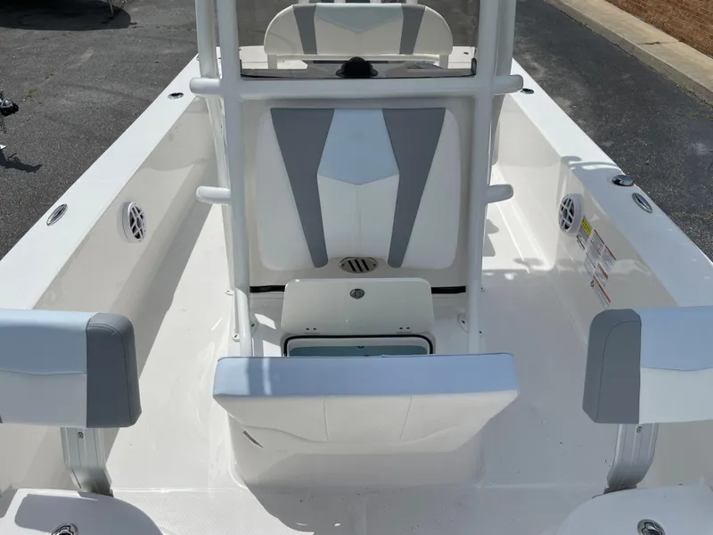 Slide: The Image of 2024 Robalo 206 Cayman boat interior with white and gray seating. - 12