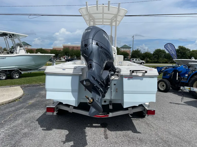 Slide: The Image of 2024 Robalo 206 Cayman boat with outboard motor, rear view. - 4