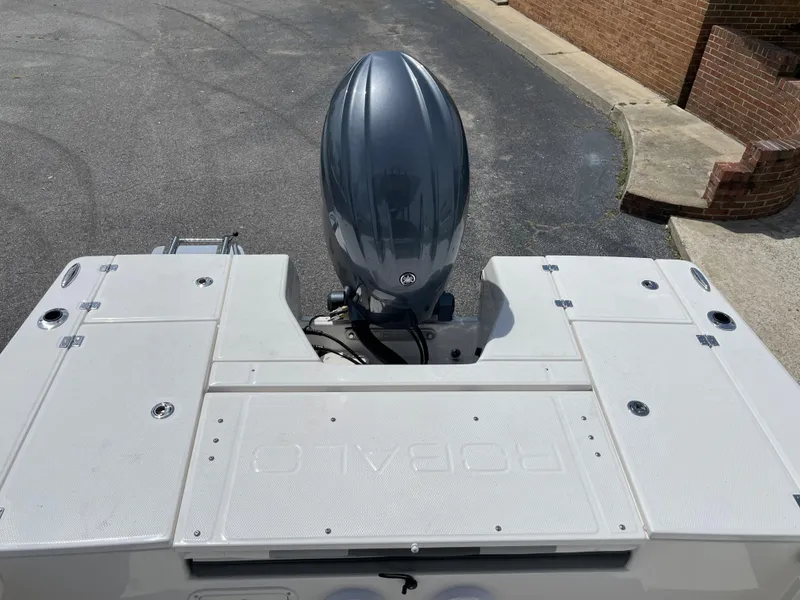 Slide: The Image of 2024 Robalo 226 Cayman boat stern with outboard motor. - 19