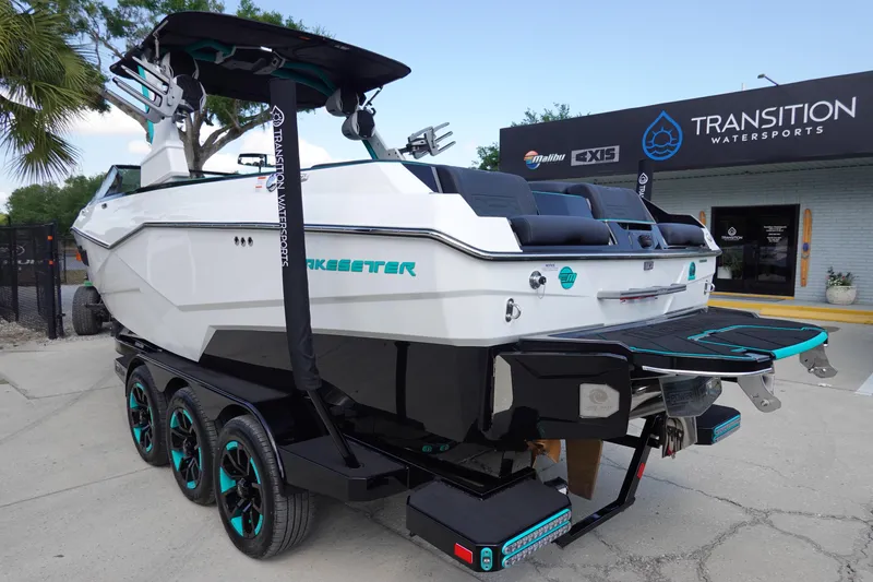 Slide: The Image of 2023 Malibu 25 LSV boat on trailer at Transition Watersports. - 11