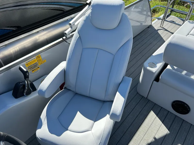 Slide: The Image of 2024 Bentley Pontoons Legacy Swingback 220 captain's chair and console. - 10