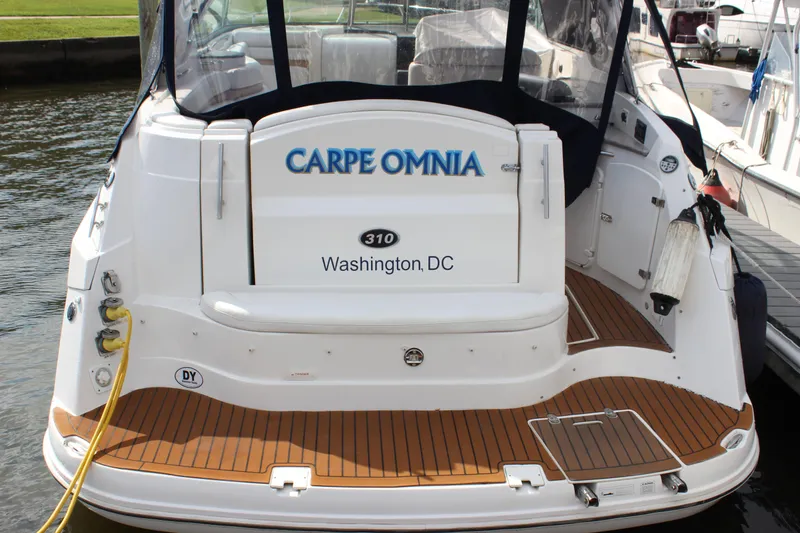Slide: The Image of 2011 Rinker 310 Express Cruiser docked, named Carpe Omnia, Washington, DC. - 33