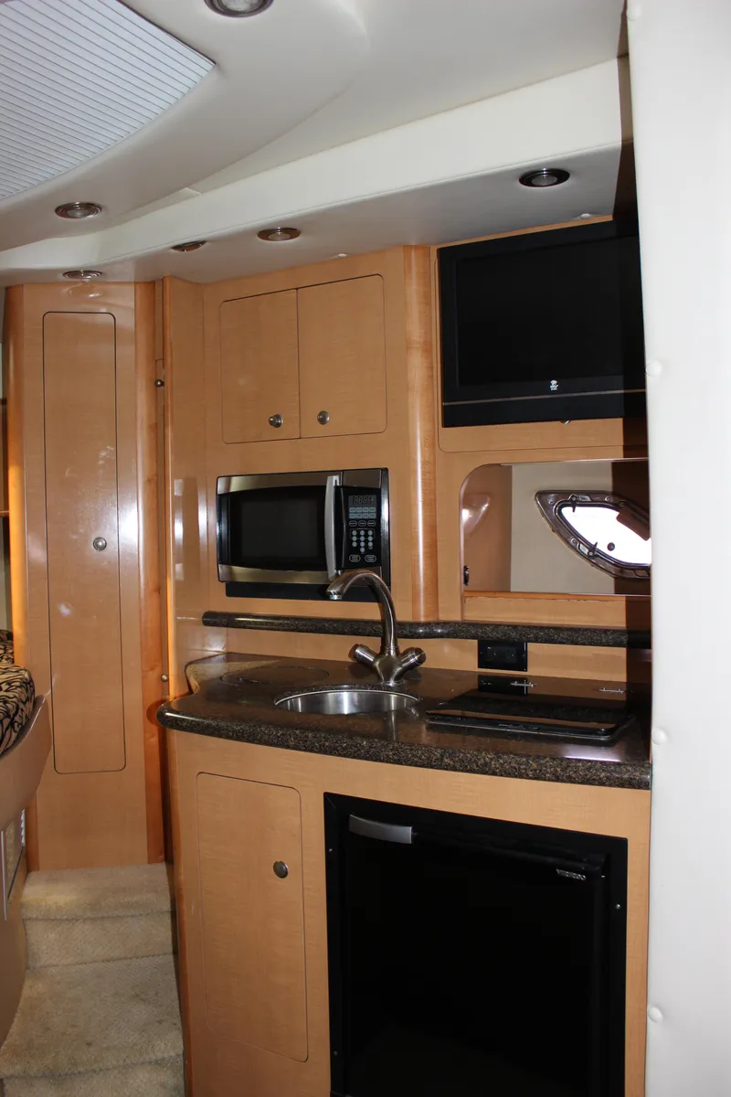 Slide: The Image of Rinker 310 Express Cruiser 2011 - 50