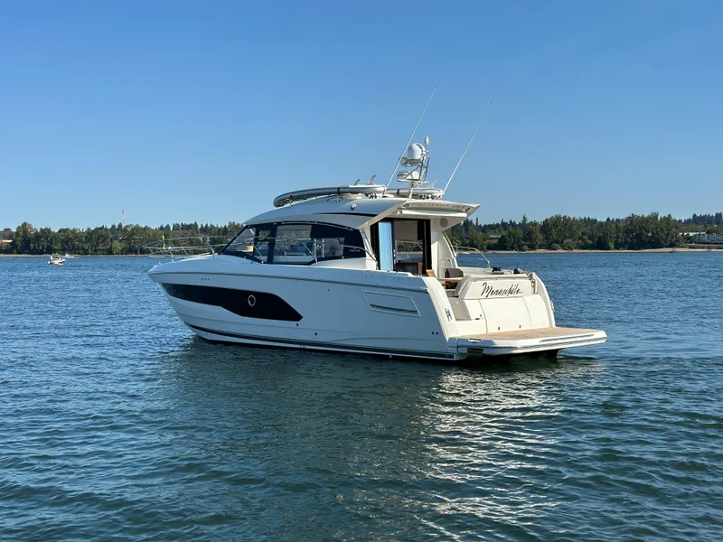 Slide: The Image of 2021 Prestige 420 S yacht on calm water. - 2