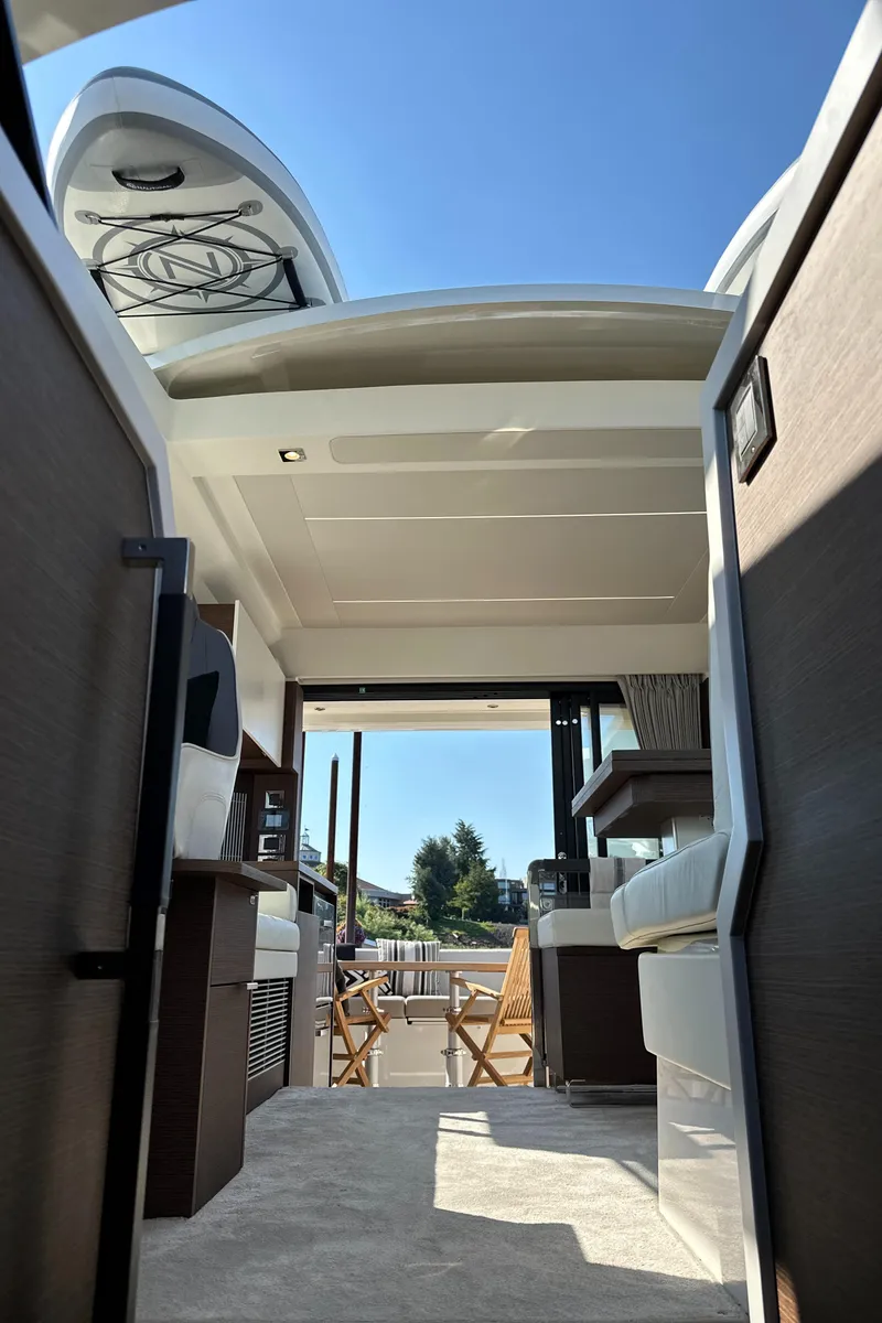 Slide: The Image of Interior view of 2021 Prestige 420 S yacht with open deck and seating area. - 33