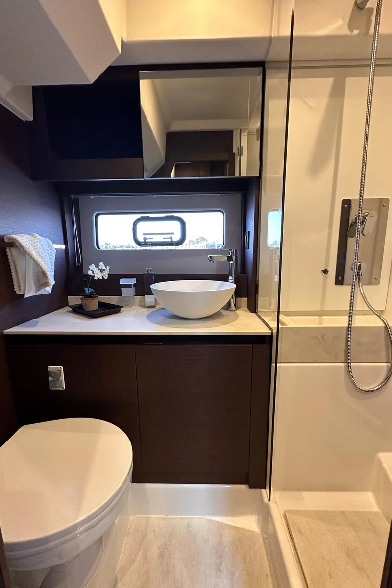 Slide: The Image of Modern bathroom in 2021 Prestige 420 S yacht with sleek fixtures and elegant design. - 38