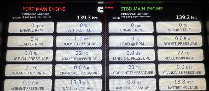 Slide: The Image of Engine status display of a 2021 Prestige 420 S yacht showing port and starboard main engine data. - 49