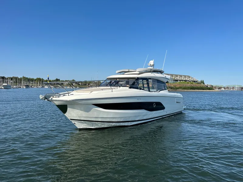 Slide: The Image of 2021 Prestige 420 S yacht cruising on a sunny day. - 6