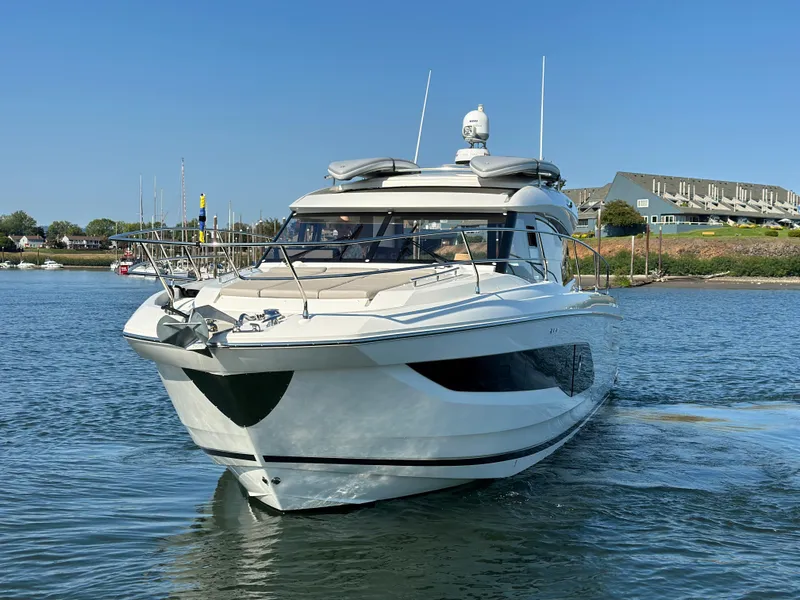 Slide: The Image of Prestige 420 S 2021 yacht cruising on a sunny day in a marina. - 7