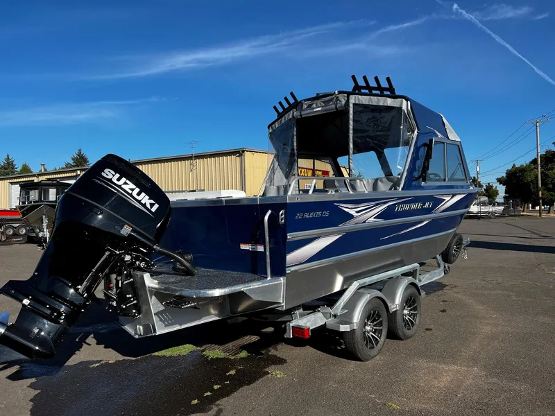 Slide: The Image of 2024 Thunder Jet 22 Alexis OS boat with Suzuki outboard motor on trailer. - 3