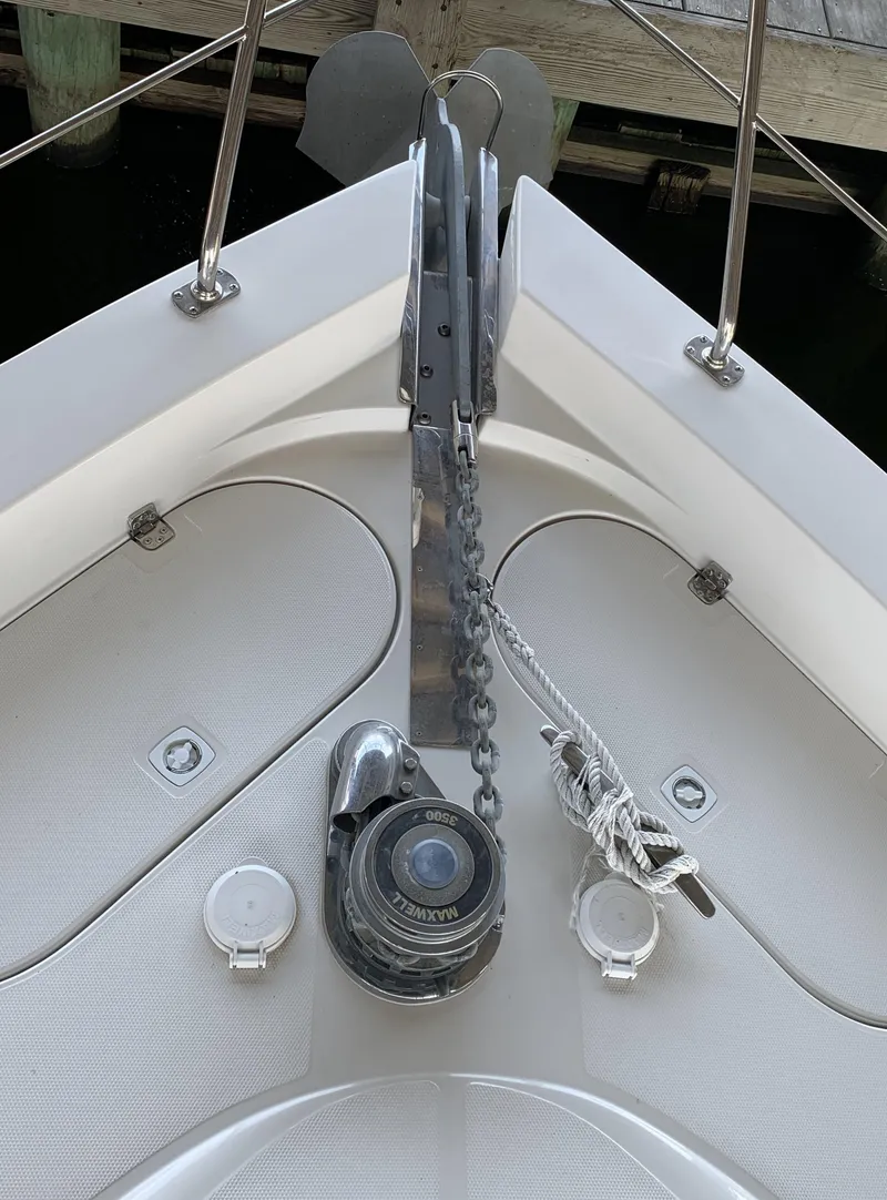 Slide: The Image of 2007 Carver 56 Voyager yacht bow with anchor chain and winch system. - 15