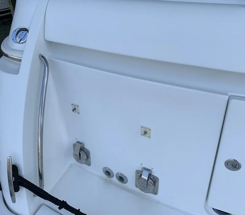 Slide: The Image of 2007 Carver 56 Voyager yacht stern with stainless steel fittings and white finish. - 28