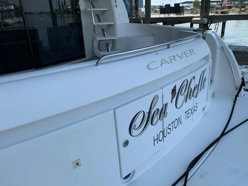 Slide: The Image of 2007 Carver 56 Voyager yacht docked, named "Sea Chelle," from Houston, Texas. - 29