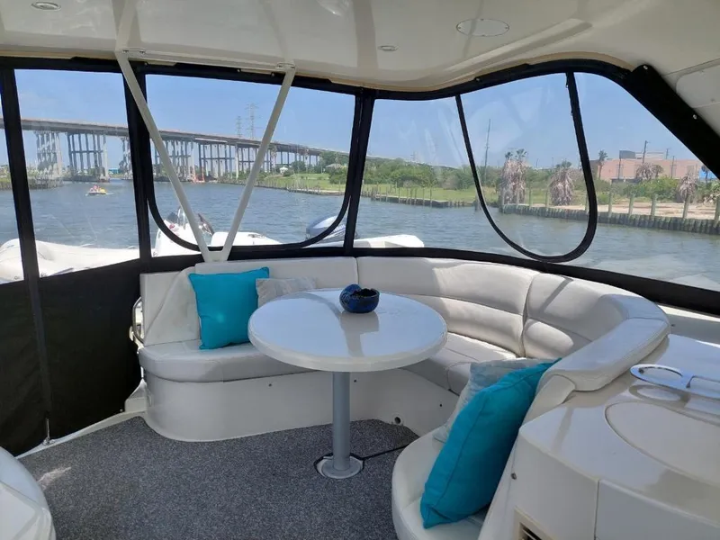 Slide: The Image of Luxurious 2007 Carver 56 Voyager yacht interior with scenic river view. - 3