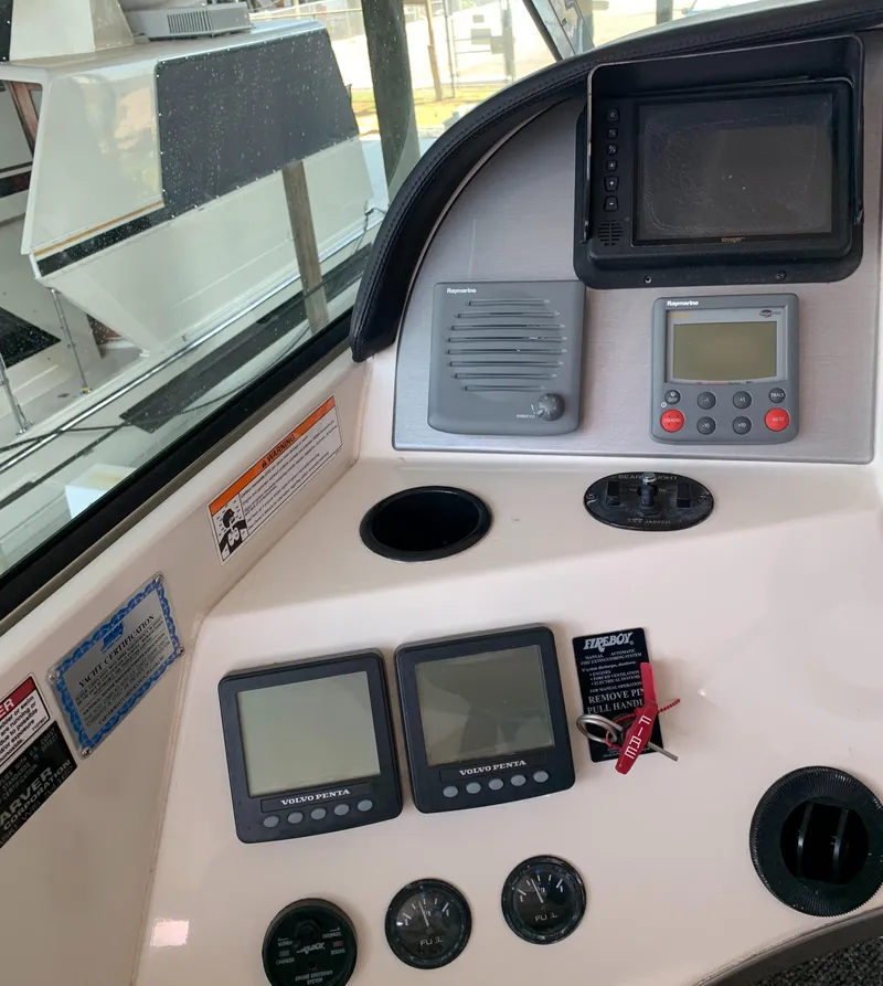 Slide: The Image of Control panel of a 2007 Carver 56 Voyager yacht with navigation instruments. - 37