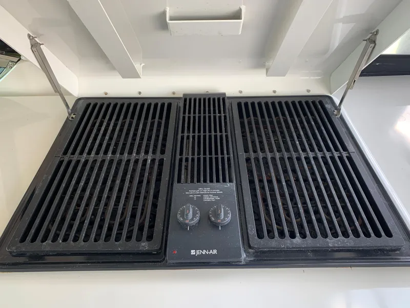Slide: The Image of Built-in Jenn-Air grill on 2007 Carver 56 Voyager yacht. - 46