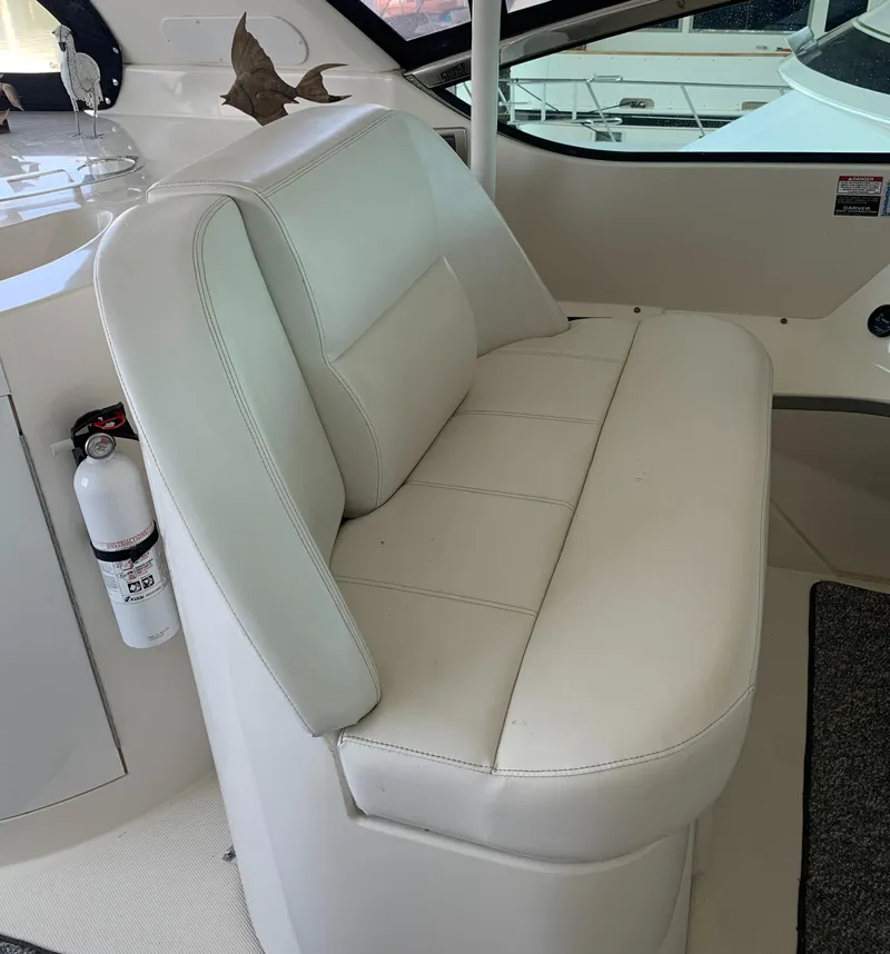 Slide: The Image of White leather seating on 2007 Carver 56 Voyager yacht interior. - 49